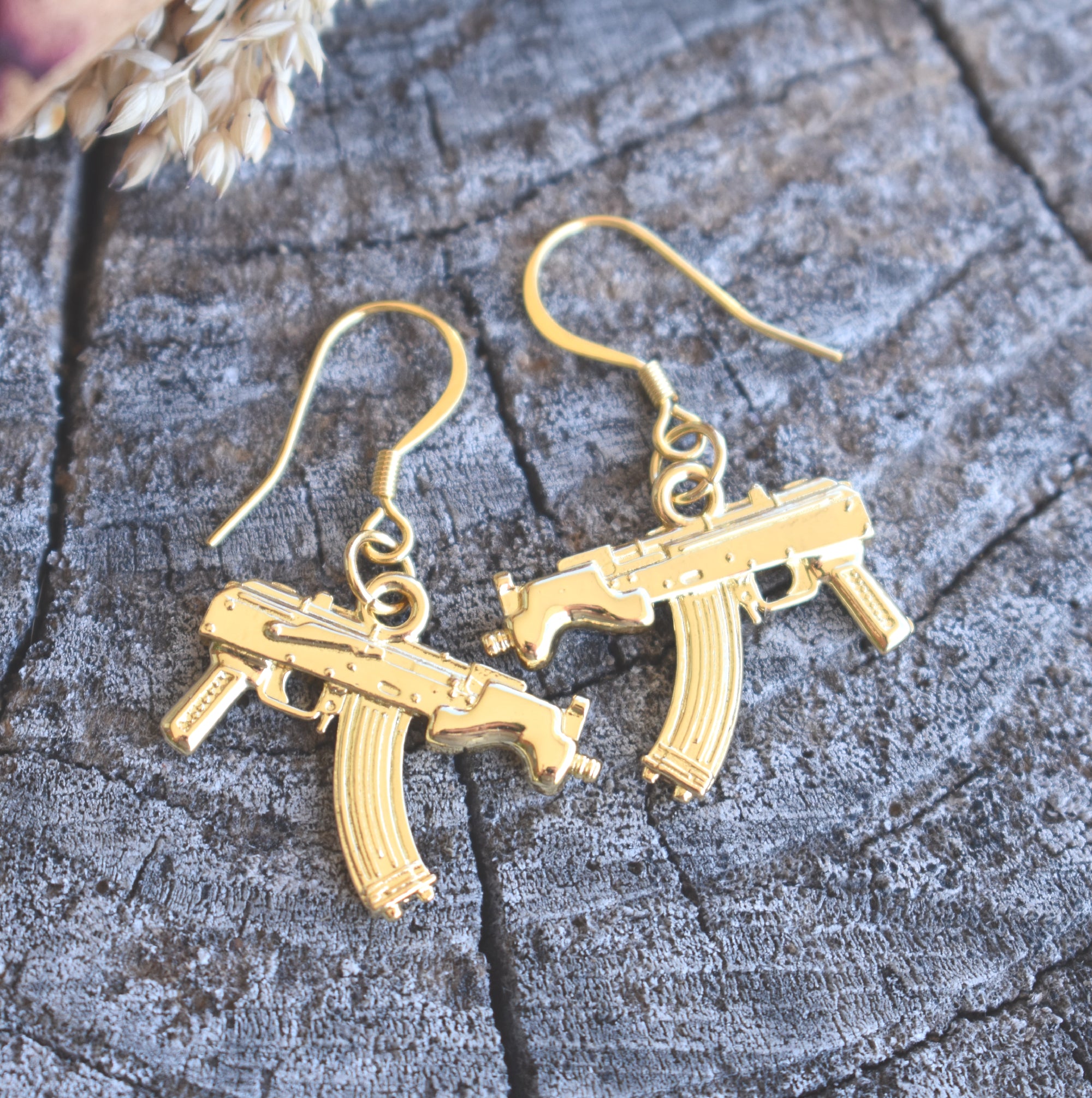 Gold on sale gun earrings